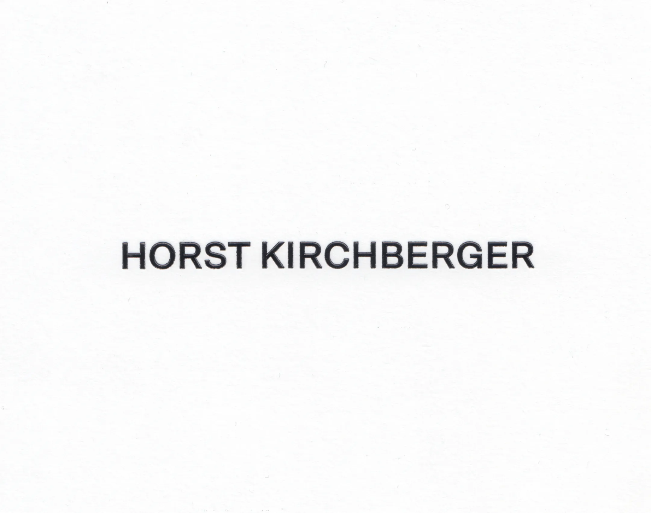 Wortmarke "Horst Kirchberger" auf hochwertigem weißen Papier geprägt