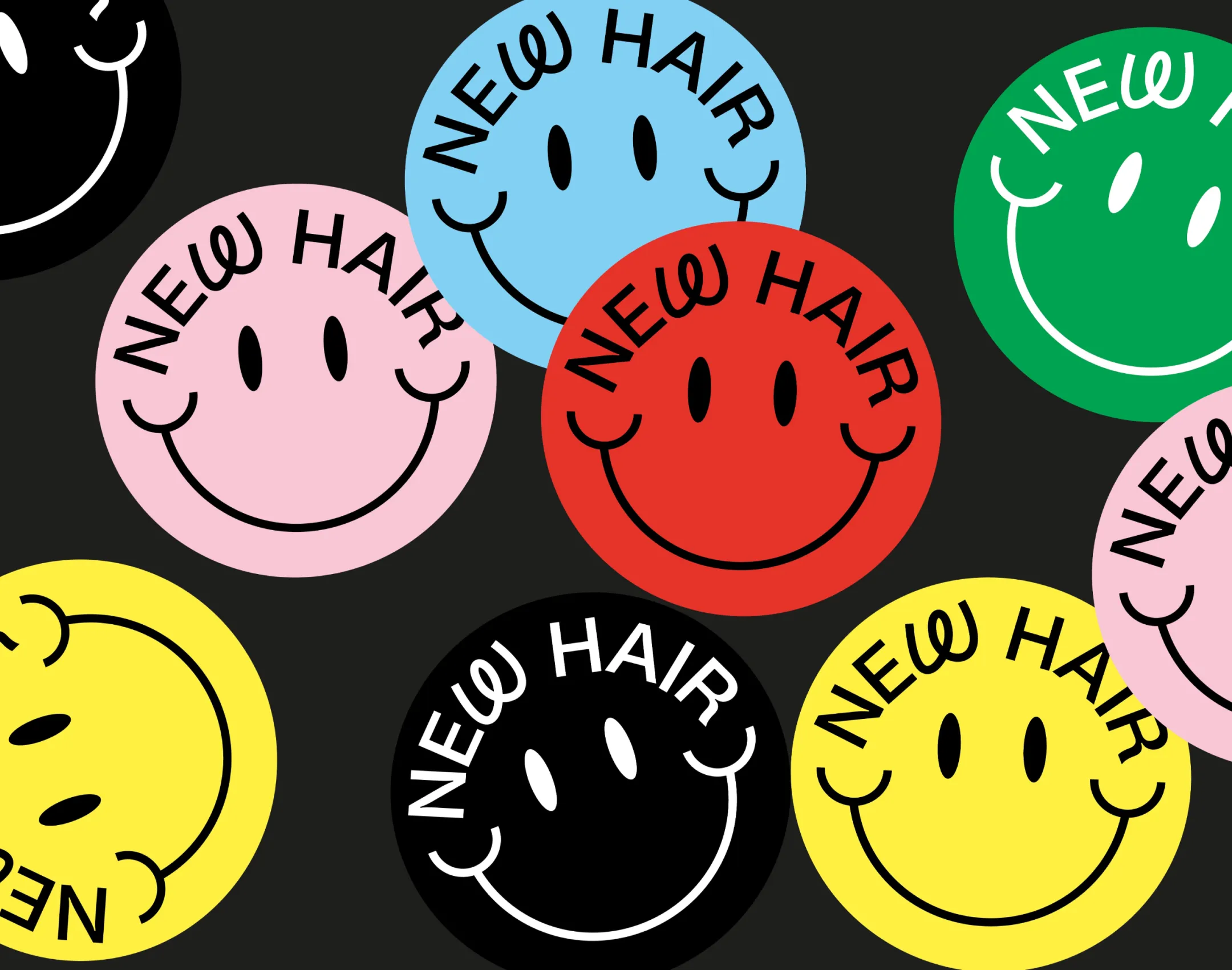 Bunte runde Sticker mit dem New Hair Logo auf schwarzem Hintergrund